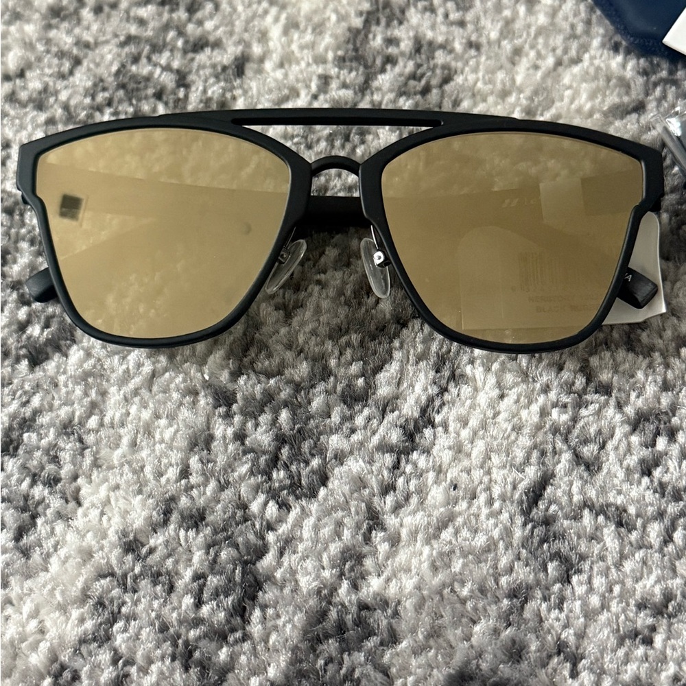 Le Specs Herstory black rubber and gold sunglasses